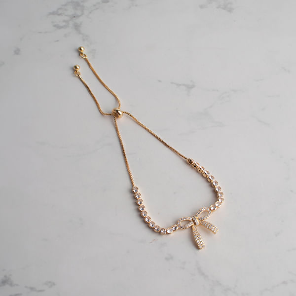 Pulsera con Dije Lazo Plateado