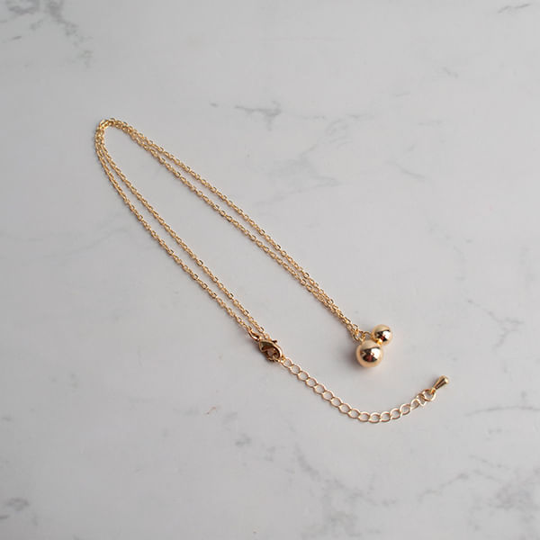 Collar con Dije Esferas Dorado