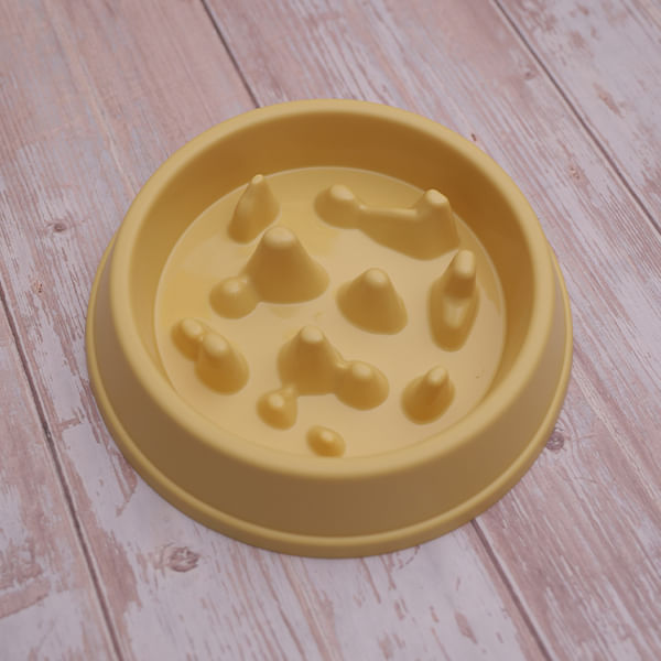 Plato come lento para mascotas amarillo