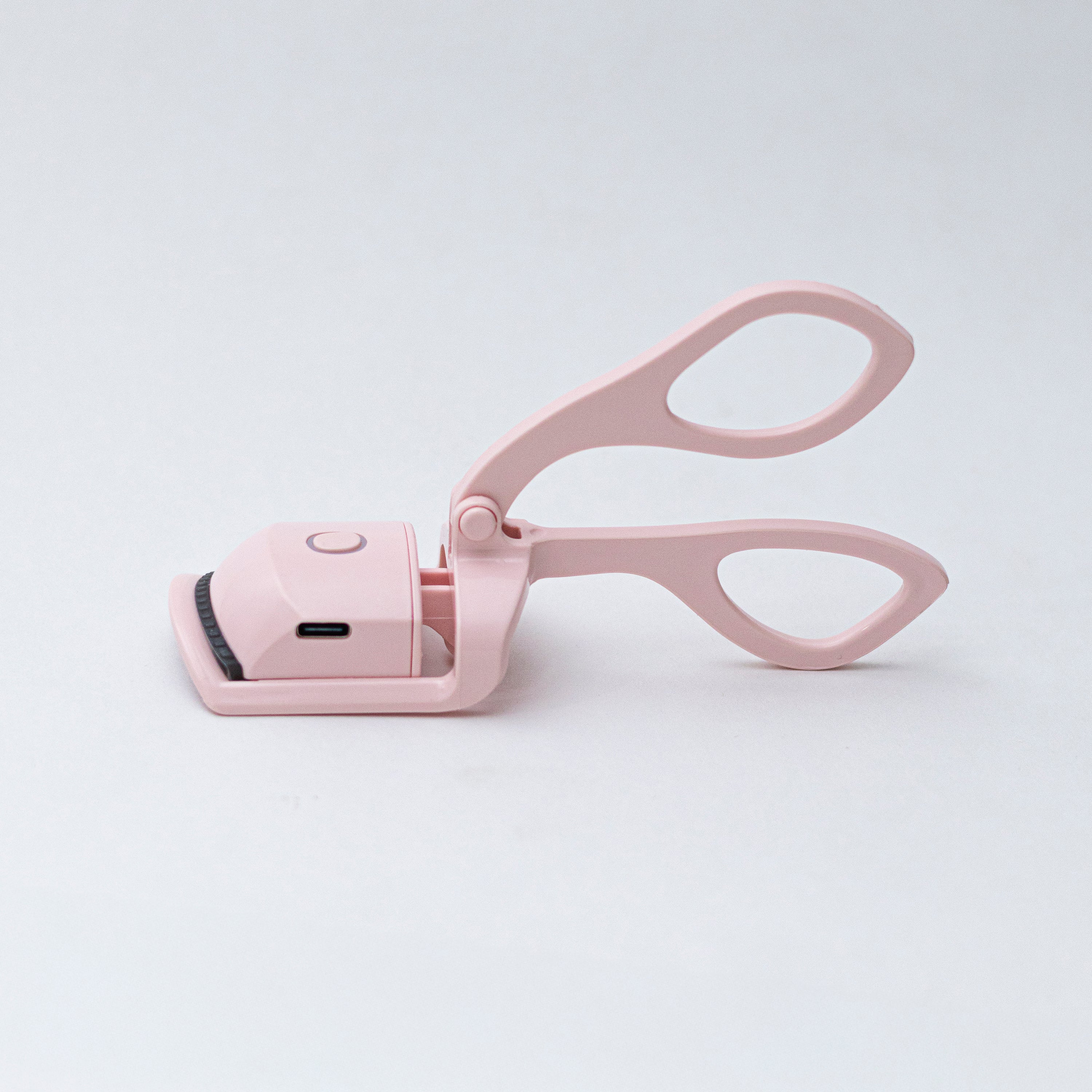 Rizador de pestañas eléctrico Rosa