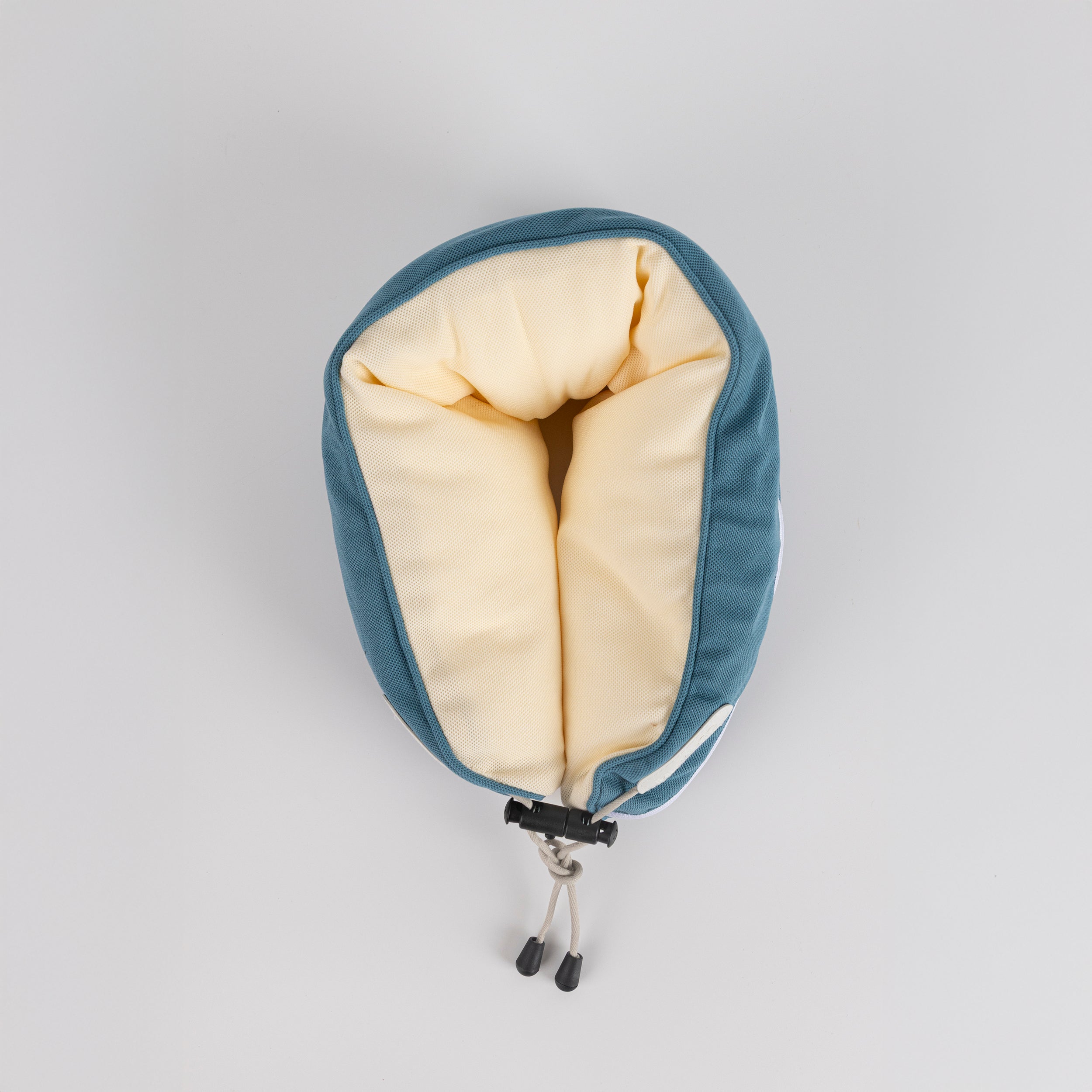 Almohada en forma de U con partículas en colores combinados