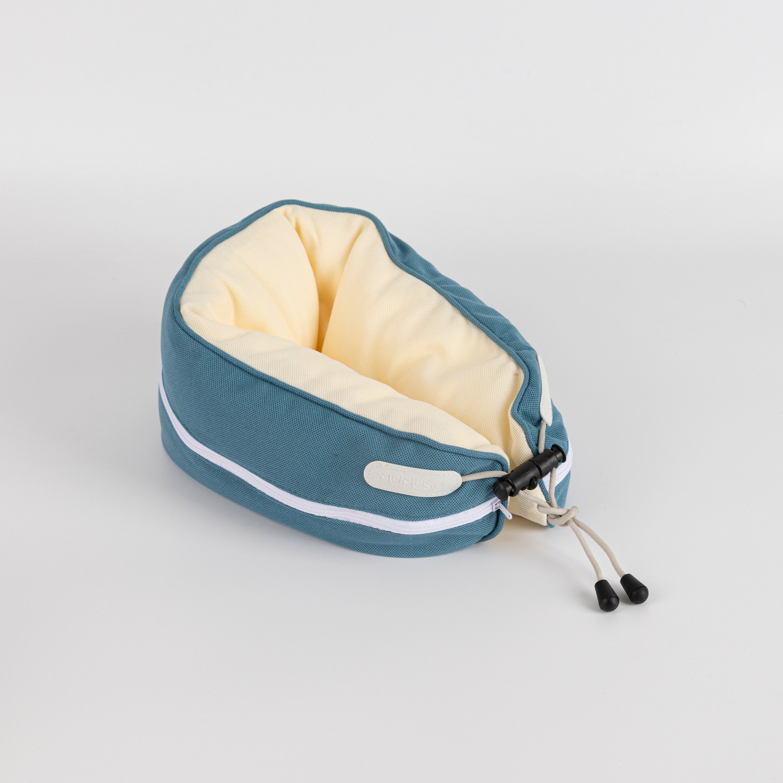 Almohada en forma de U con partículas en colores combinados