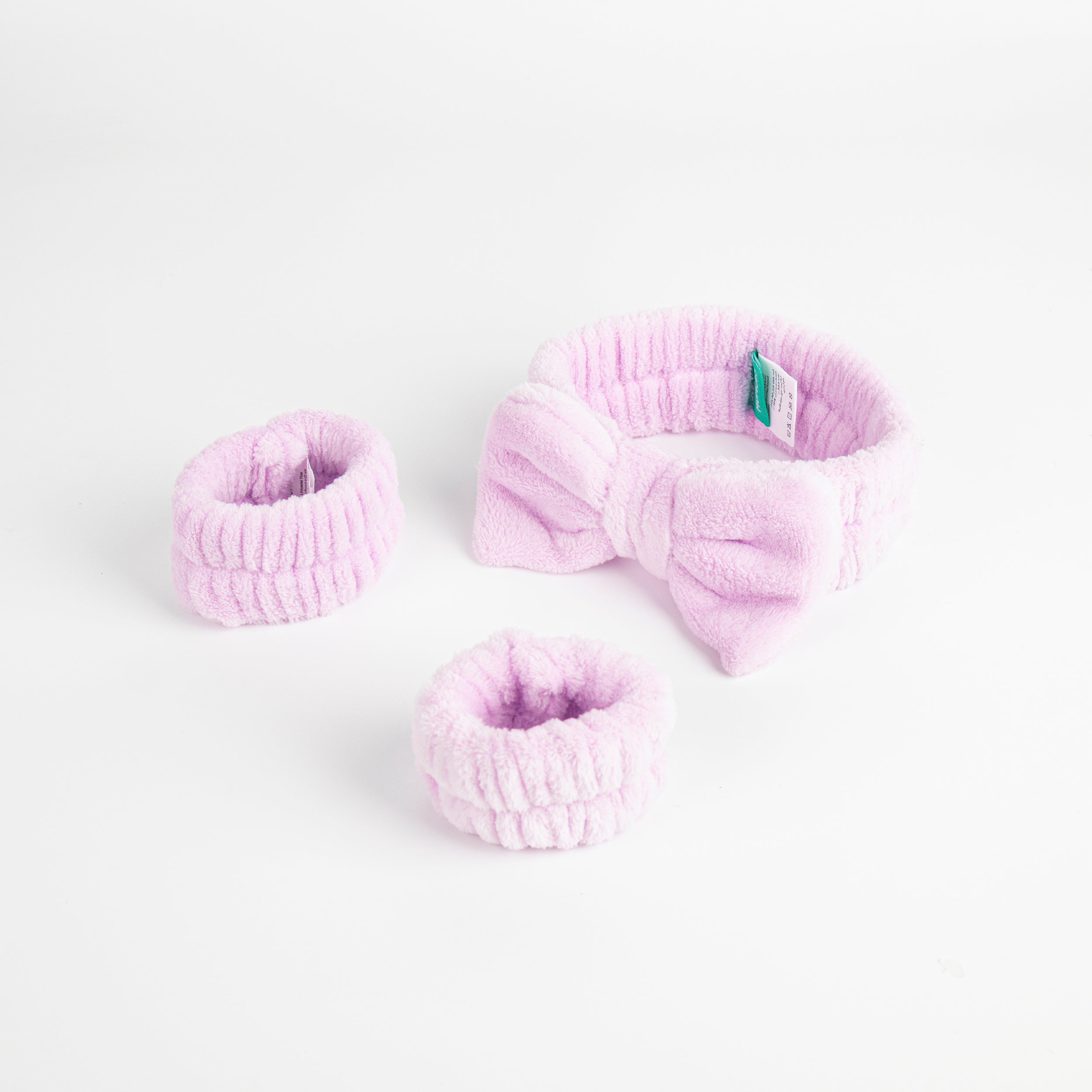 Set de diadema y muñequera con lazo rosa